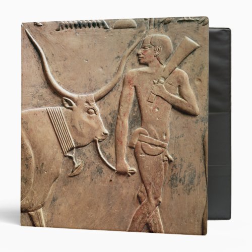 Relief depicting peasant leading cow to 3 ring binder