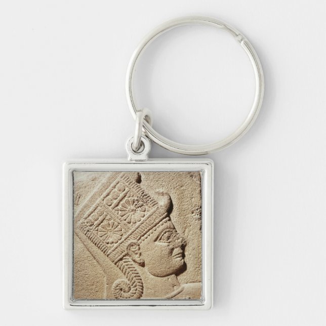 Relief depicting the head of a young prince keychain (Front)