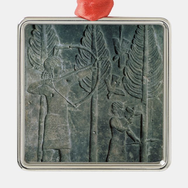 Relief depicting the hunting of birds in the metal ornament (Front)