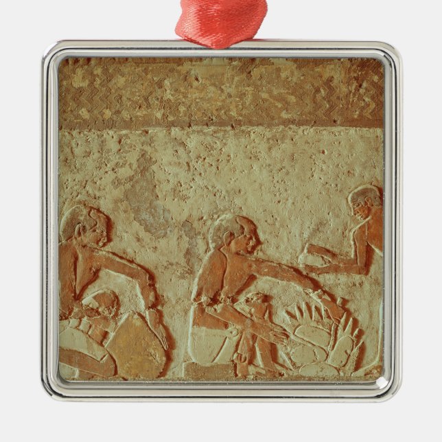 Relief depicting the making and baking of bread metal ornament (Front)