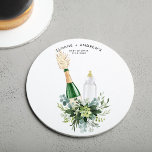 REMY Poppin Bottles Baby Shower Round Paper Coaster<br><div class="desc">The Remy collection showcases an exquisite design that is perfect for a "Poppin' Bottles" baby shower. Featuring a stunning popped champagne bottle and a delicate baby bottle, coupled with intricate watercolor greenery, this collection creates a beautiful and memorable aesthetic that is sure to impress and delight all of your guests....</div>