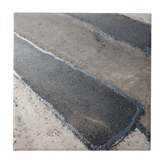 Repair pavement and laying new asphalt ceramic tile
