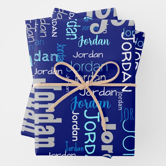  Repeating Name Shades of Blue & Silver Christmas Wrapping Paper Sheets (In situ)