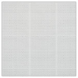 Repeating pattern of small, stylized shapes on a w fabric