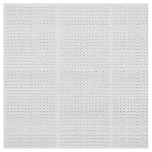 Repeating pattern of small, stylized shapes on a w fabric