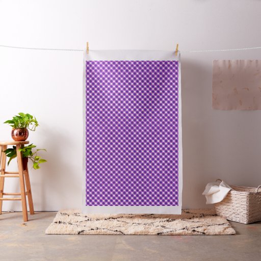 Repeating stars pattern on purple fabric