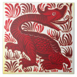 Repro Lewis Carrol De Morgan Red Jabberwacky Tile<br><div class="desc">This is the same as one of the tiles Charles Dodson (better known as Lewis Carrol, the creator of Alice in Wonderland) used on one of the two fireplace surrounds that Dodson chose De Morgan tiles to decorate in the early 1880s. The original has an irridescent red lustre glaze that...</div>