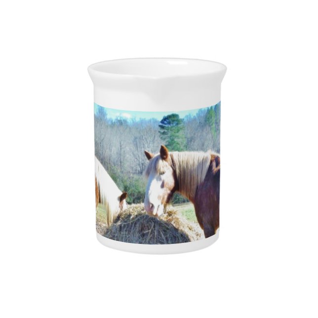 Rescued Draft Horses eating hay Beverage Pitcher (Front)