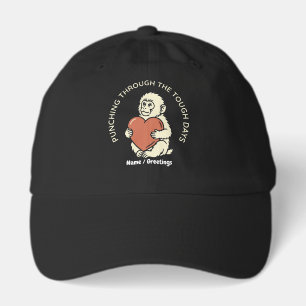Resilient Baby Monkey & Heart Punching Through Hat