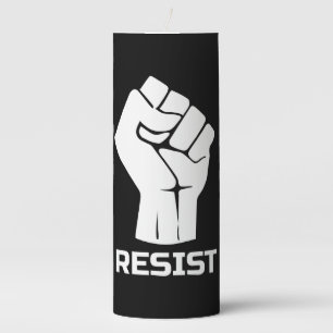 Resist with fist - in white pillar candle