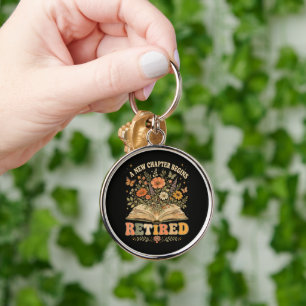 Retired A New Chapter Begins Retro Floral Book Keychain