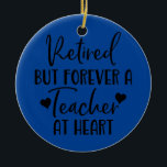 Retired But Forever a Teacher at Heart Teacher Ceramic Ornament<br><div class="desc">Retired But Forever a Teacher at Heart Teacher Retirement Gift. Perfect gift for your dad,  mom,  papa,  men,  women,  friend and family members on Thanksgiving Day,  Christmas Day,  Mothers Day,  Fathers Day,  4th of July,  1776 Independent day,  Veterans Day,  Halloween Day,  Patrick's Day</div>