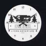 Retired RV | Camping Campers Personalized Names Round Clock<br><div class="desc">Personalized camping wall clock- Rustic black and white camping design features a classic vintage motorhome silhouette and pine trees. Black clock face numerals. Add customized couple names below in whimsical letters. Option to customize text, such as favorite saying, family last name, etc. Unique personalized retirement gift for retirees. Or nice...</div>