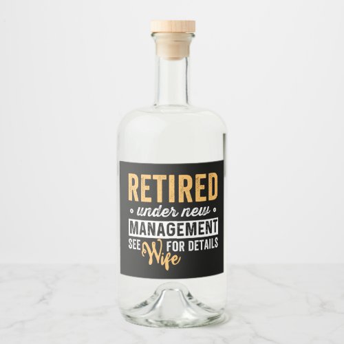 retired under new management see wife for details liquor bottle label