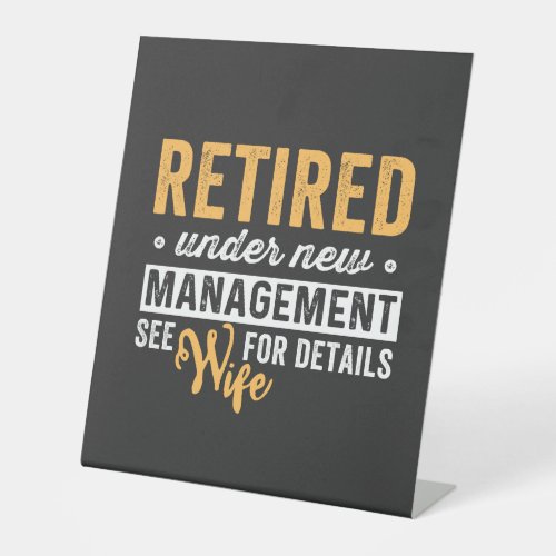 retired under new management see wife for details pedestal sign
