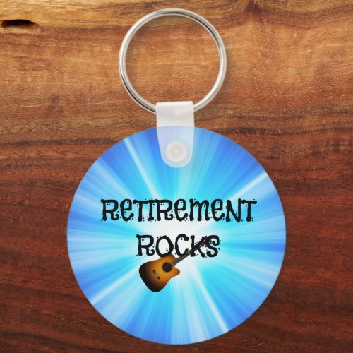 Retirement Rocks guitar on blue sunburst design Keychain