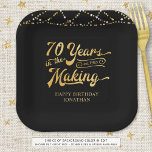 Retro 70th Birthday 70 Years in the Making Lights Paper Plates<br><div class="desc">Retro 70th birthday personalized party paper plates featuring the title 70 YEARS IN THE MAKING in a calligraphy script typography which incorporates his or her birth year within the design and your custom text below (the sample shows HAPPY BIRTHDAY NAME) in gold accented with string lights and your choice of...</div>