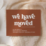 Retro and Boho | Terracotta Moving Announcement Postcard<br><div class="desc">This trendy,  boho style moving announcement says "we have moved" in retro white typography on a simple terracotta background. The perfectly stylish way to let friends and family know that you have a new home.</div>