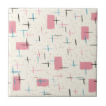 Retro Atomic Pink Pattern Ceramic Tile<br><div class="desc">You'll be tickled pink by this Retro Atomic Pink Pattern Ceramic Tile. The design features a cream background with gold speckles, pink rectangles, and black, turquoise, and pink slashes. The pattern is reminiscent of traditional mid century modern style. You're sure to enjoy our homage to the 1950s. Buy this today...</div>