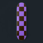 Retro Black and Purple Checkered Squares Pattern Skateboard<br><div class="desc">Make a bold statement at the skate park with this retro-inspired skateboard featuring a black and purple checkered pattern. With its edgy 90s vibe and high-contrast colors,  this board is perfect for skaters who love alternative,  punk,  or grunge aesthetics</div>