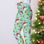Retro Blue Red Santa Hat Holly Berries Christmas Leggings<br><div class="desc">This whimsical design was created using my hand painted holly and berries and classic Santa hat on a soft aqua blue background for a fun retro vibe!  Change out the background color for any color you choose in the design tool.  Original art by Malissa Melrose.</div>