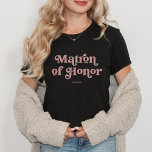 Retro Boho Dusty Rose Typography | Matron of Honor T-Shirt<br><div class="desc">This trendy,  simple T-shirt features the words "Matron of Honor" in retro dusty rose typography,  along with a space for her name,  and is the perfect gift for members of your bridal party.</div>