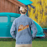 Retro Bride Typography Summer Rainbow Wedding T-Sh Denim Jacket<br><div class="desc">Elevate your wedding day style with our Groovy Bride Denim Jacket. This unique jacket showcases a retro-inspired rainbow design paired with 70's typography, creating a playful and boho aesthetic. The color scheme features terracotta, orange, mustard-yellow, and beige, giving it a distinctive and groovy vibe. Whether you're a free spirit or...</div>