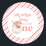 Retro Christmas pink Santa First Birthday Classic Round Sticker<br><div class="desc">Retro Christmas Santa first birthday party with retro style pink santa and pink and red stripes. Oh what fun it is to be one!</div>