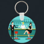 Retro Cocktail Lounge Button Keychain<br><div class="desc">Every hour is happy hour with this Retro Cocktail Lounge Button Keychain. The mid century modern design features a vibrant, 1960's style, minimalist, cartoon drawing of a classy, cocktail bar. Against the backdrop of an aqua wall, we can see rows of drink glasses. At least we can see the teal...</div>