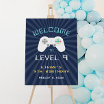 Retro Gamer Theme Kids Birthday Party Welcome Sign<br><div class="desc">Welcome guests to your child's video game themed birthday party with this cool retro sign featuring a video game controller on a navy blue background with vintage digital style lettering. "Welcome to level [age]" appears at the top,  with your child's name,  party occasion and date beneath.</div>