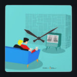 Retro Gay Couple Watching TV Acrylic Wall Clock<br><div class="desc">This Retro Gay Couple Watching TV design is simply fabulous! The 1960s style, minimalist art design features the back of a cozy couple and binging their favorite black and white television show. The sophisticated, turquoise and teal room prominently features a stone wall. The well-dressed men are holding martinis. Cheers to...</div>