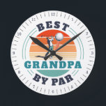 Retro Golf Grandpa Birthday Funny Golfing Custom Round Clock<br><div class="desc">Retro Best Grandpa By Par design you can customize for the recipient of this cute golf theme design. Perfect gift for Father's Day or grandfather's birthday. The text "GRANDPA" can be customized with any dad moniker by clicking the "Personalize" button above. Can also double as a company swag if you...</div>