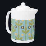 Retro Green and Blue Cute Folksy Floral Pattern Teapot<br><div class="desc">Playful and fun are the words that come to mind as you look upon this sweet retro green and blue folksy floral pattern. Oh so adorable and super cute as well. This classic floral pattern translates perfectly to both fashion and home decor items. The perfect gift for any 1960's era...</div>