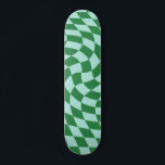 Retro Green And Blue Warped Checkered Checkerboard Skateboard<br><div class="desc">Trendy,  modern psychedelic retro distorted and warped checkerboard design. Seventies trippy warped checks for you. Checkered warped skateboard,  warped checks skateboard,  retro seventies checkered skateboard</div>