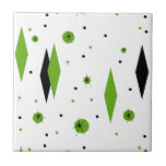 Retro Green Diamonds & Starbursts Ceramic Tile<br><div class="desc">This customizable Retro Green Diamonds and Starbursts Ceramic Tile is a new take on a vintage style. It features kitschy, black starbursts on green polka dots, surrounding geometric, green and black diamond shapes. Customize the background color on this mid century modern product if you're feeling daring, or leave it white...</div>