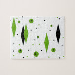 Retro Green Diamonds & Starbursts Puzzle<br><div class="desc">This customizable Retro Green Diamonds and Starbursts Puzzle is a new take on a vintage style. It features kitschy, black starbursts on green polka dots, surrounding geometric, green and black diamond shapes. Customize the background color on this mid century modern product if you're feeling daring, or leave it white if...</div>