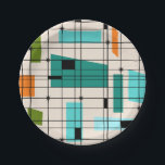 Retro Grid & Starbursts Paper Plate<br><div class="desc">This Retro Grid and Starbursts Paper Plate is where vintage style meets modern day. It features a cream colored background with kitschy, off kilter squares and rectangles in teal, turquoise, This light blue, orange, and avocado green. The whimsical blocks of color are overlayed are worked into some of the grid...</div>