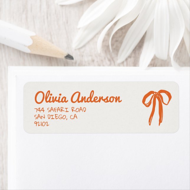 Retro Hand Drawn Written Orange Bow Baby Shower Label (Insitu)