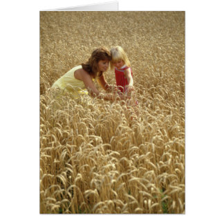 Retro-look Mother and Daughter in Wheat Field