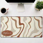 Retro Modern Abstract Marble Swirl Brown And Cream Desk Mat<br><div class="desc">Immerse yourself in a dance of colors with our Abstract Retro Modern Liquid Marble Wave Pattern. Evoking the dynamic fluidity of marbled surfaces and the charming aesthetics of retro-modern design, this pattern is a feast for the eyes. A symphony of vibrant colors swirls and flows in wave-like motions, creating a...</div>