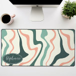 Retro Modern Abstract Marble Swirl Pink And Mint Desk Mat<br><div class="desc">Immerse yourself in a dance of colors with our Abstract Retro Modern Liquid Marble Wave Pattern. Evoking the dynamic fluidity of marbled surfaces and the charming aesthetics of retro-modern design, this pattern is a feast for the eyes. A symphony of vibrant colors swirls and flows in wave-like motions, creating a...</div>