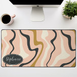 Retro Modern Abstract Marble Swirl Pink Gold Black Desk Mat<br><div class="desc">Immerse yourself in a dance of colors with our Abstract Retro Modern Liquid Marble Wave Pattern. Evoking the dynamic fluidity of marbled surfaces and the charming aesthetics of retro-modern design, this pattern is a feast for the eyes. A symphony of vibrant colors swirls and flows in wave-like motions, creating a...</div>