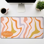 Retro Modern Abstract Pink Orange Marble Swirl Desk Mat<br><div class="desc">Immerse yourself in a dance of colors with our Abstract Retro Modern Liquid Marble Wave Pattern. Evoking the dynamic fluidity of marbled surfaces and the charming aesthetics of retro-modern design, this pattern is a feast for the eyes. A symphony of vibrant colors swirls and flows in wave-like motions, creating a...</div>