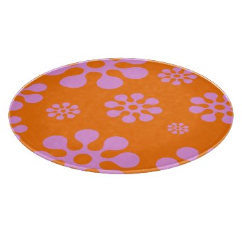 Retro Orange And Pink Floral Cutting Board by machomedesigns at Zazzle