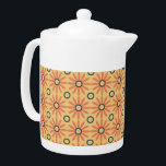 Retro Orange & Black Cute Abstract Floral Pattern Teapot<br><div class="desc">Playful and fun are the words that come to mind as you look upon this sweet retro orange and black abstract floral pattern. Oh so adorable and super cute as well. This classic daisy inspired floral pattern translates perfectly to both fashion and home decor items. The perfect gift for any...</div>