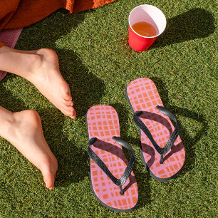 Retro pastel orange pink pattern flip flops