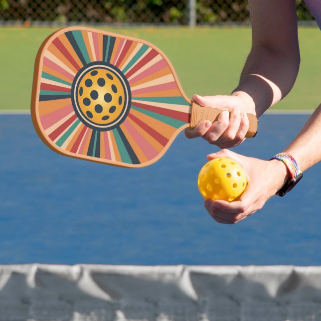 Retro pickleball paddle - stripes & ball (Insitu)