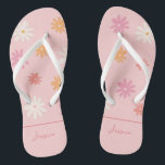 Retro Pink Daisy Flip Flops for Bridesmaids<br><div class="desc">Step into retro summer in style with these personalized Ditzy Daisy flip flops! The light pink flip flops feature a playful and nostalgic daisy pattern, perfect for adding a touch of fun to any bachelorette or wedding celebration. The white straps are comfortable and durable, making them ideal for a day...</div>