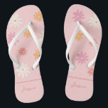 Retro Pink Daisy Flip Flops for Bridesmaids<br><div class="desc">Step into retro summer in style with these personalized Ditzy Daisy flip flops! The light pink flip flops feature a playful and nostalgic daisy pattern, perfect for adding a touch of fun to any bachelorette or wedding celebration. The white straps are comfortable and durable, making them ideal for a day...</div>