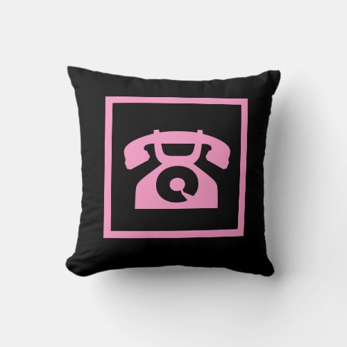 retro  pink phone on black pillow